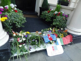 Memorial flowers left by protestors outside the Indonesian Embassy in London