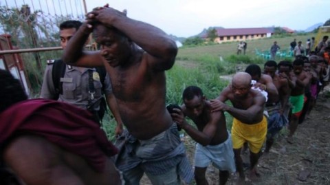 Apartheid in West Papua. West Papuans are stripped, tortured and led away like slaves after a pro-independence congress in 2011