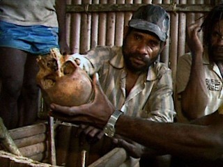 West Papuan man shows an undercover journalist the skull of a fellow Papuan shot by the Indoensian military 